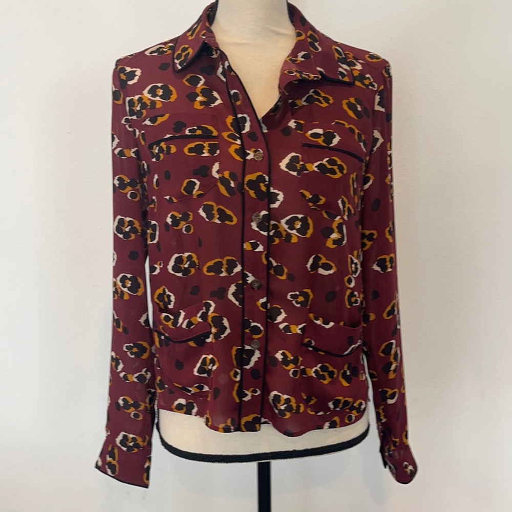 The Korner black red cheetah print collared button down blouse shirt top. NWOT